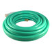 A close-up of a Flexon green water hose with a brass fitting.
