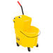 A yellow Rubbermaid mop bucket with a red handle.