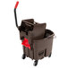 A Rubbermaid brown mop bucket with a side press wringer and handle.