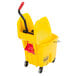 A yellow Rubbermaid mop bucket with a red wringer handle.