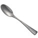 A close-up of a Oneida Lexia stainless steel teaspoon with a metal handle.
