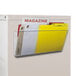 A Storex clear magnetic wall file holding file folders.