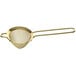 A gold metal Barfly conical strainer with a long handle.