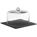 A black square slate tray with a glass dome cover on top.