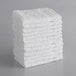 A stack of white Lavex wash cloths.