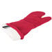 A red oven mitt with a white cloth inside.