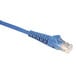 A close-up of a blue Tripp Lite Cat6 Ethernet cable with a white background.