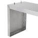 A stainless steel Vollrath double deck overshelf with metal brackets.