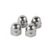 A close-up of four shiny stainless steel nuts.