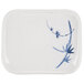 A white rectangular melamine plate with blue painted bamboo leaves on it.