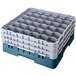 A teal plastic Cambro glass rack with 36 compartments and 2 teal plastic extenders.