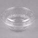 A Dart clear plastic bowl with a round lid.