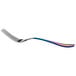 A close-up of a Reserve by Libbey stainless steel dinner fork with a rainbow colored handle.