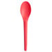 A Coral compostable plastic spoon with a red handle and spoon.