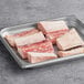 A tray of Warrington Farm Meats beef marrow bones on a gray surface.