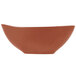 A white bowl with a brown surface and rim.