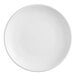 A close-up of an Acopa matte white stoneware coupe plate with a white background.