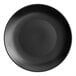 An Acopa matte black stoneware plate on a white background.