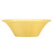 A close-up of a Libbey Farmhouse round butter yellow bowl.