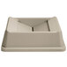 A beige square Rubbermaid trash can lid with a rectangular hole in the middle.