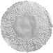 A white doily with a circular floral design.