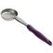 A close-up of a Vollrath purple solid round Spoodle portion spoon.