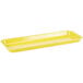 A yellow rectangular tray with a handle.