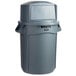 A Rubbermaid gray trash can with a dome lid.
