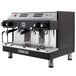 A black and silver Astra M2012 Mega II automatic espresso machine with two coffee machines.