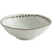 A white stoneware bowl with brown trim.