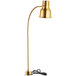 An Avantco gold countertop heat lamp with a black cord.