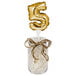 A jar with a gold foil number 5 balloon inside.