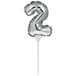A silver foil number 2 on a stick.