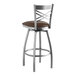 A Lancaster Table & Seating bar stool with a brown vinyl padded seat.