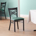 Lancaster Table & Seating Black Finish Cross Back Chair with 2 1/2" Green Vinyl Padded Seat Main Thumbnail 5