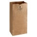 A bundle of brown Duro paper bags with black text.