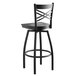 A black Lancaster Table & Seating bar stool with a black wood seat and back.