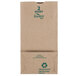 A brown paper bag with green writing that says "Duro Husky Dubl Life"