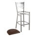A Lancaster Table & Seating metal cross back bar stool with a brown cushion