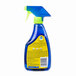 A blue SC Johnson Pledge spray bottle with a yellow label and green trigger.