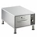 A silver rectangular stainless steel ServIt drawer warmer on a counter.