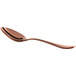 A close-up of a Reserve by Libbey Santa Cruz copper dessert spoon with a rose gold handle.