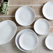 Acopa 11 3/4" x 8" Bright White Oval Coupe Stoneware Platter - 4/Pack Main Thumbnail 5
