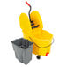 A yellow Rubbermaid mop bucket with a gray dirty water bucket attached.