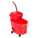 A red Rubbermaid WaveBrake mop bucket with a handle.