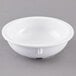 A white Carlisle Kingline nappie bowl on a gray surface.