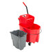 A red Rubbermaid WaveBrake mop bucket with a grey dirty water bucket.