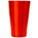 A red metal half size cocktail shaker tin.