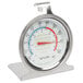 A Taylor refrigerator/freezer thermometer with a red and blue dial on a stand.