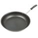 A Vollrath stainless steel frying pan with a black handle.